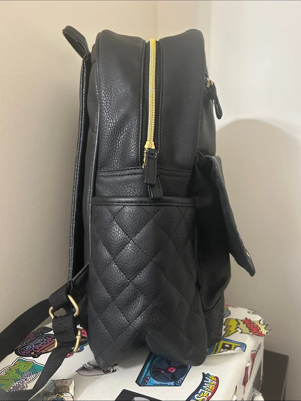 Nicole Miller Black Quilted Backpack with Gold Accents